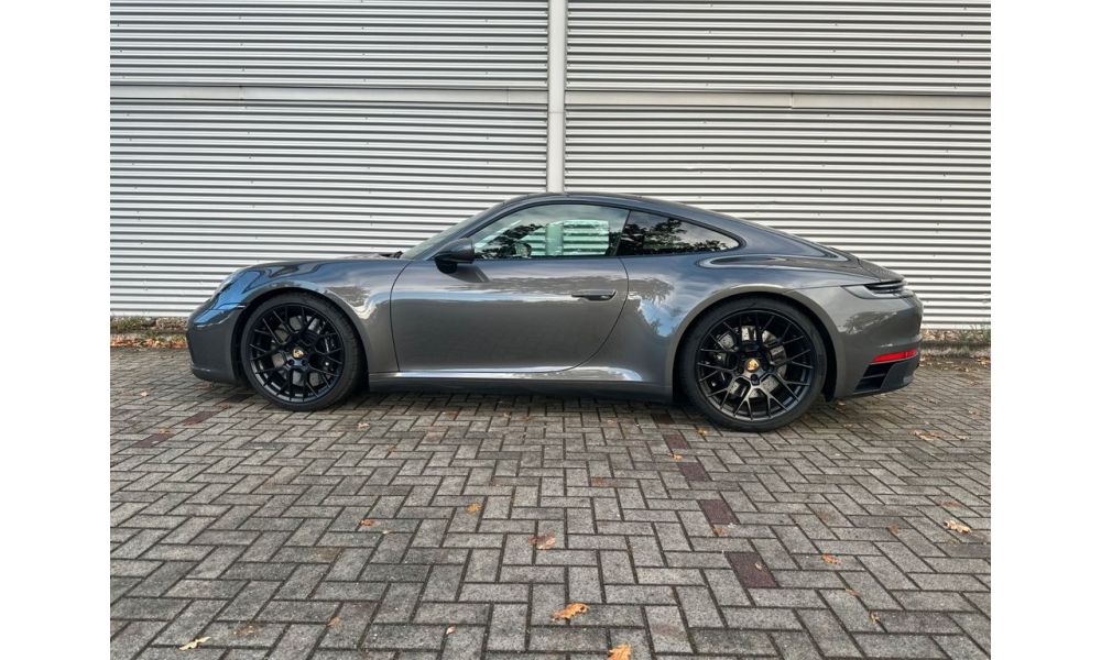 989161