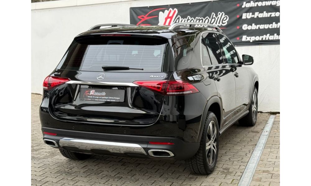 394850