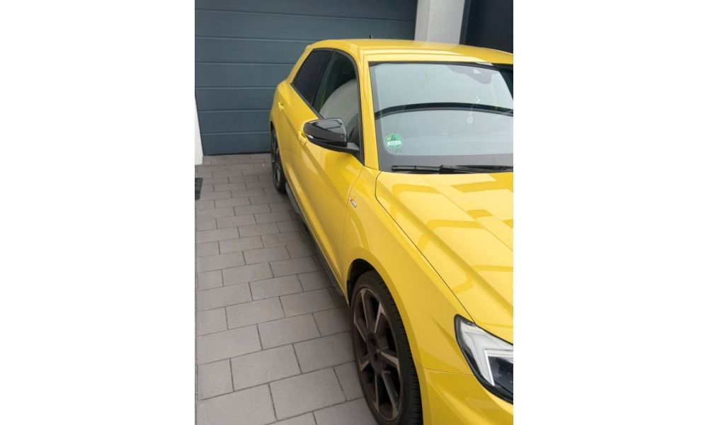 298877