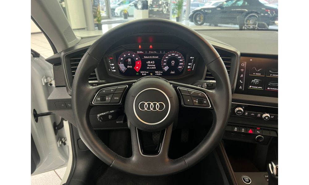 993560