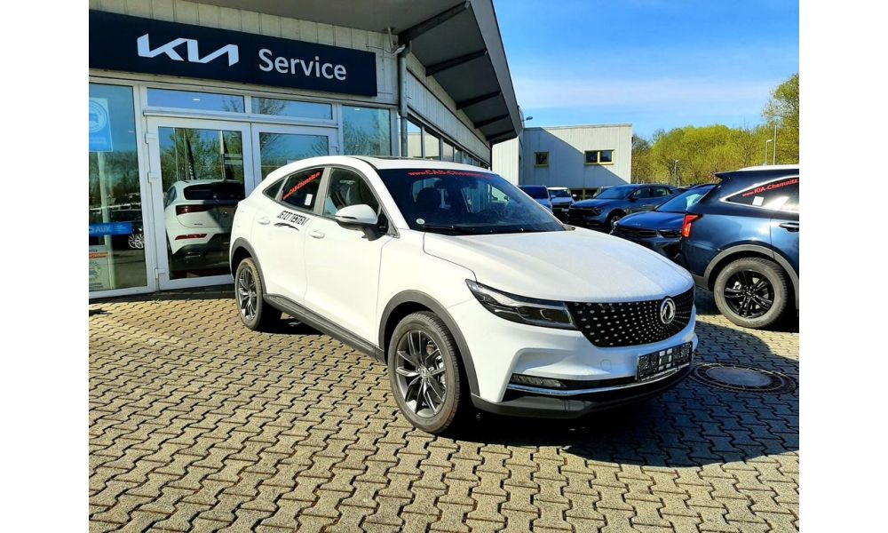 325073