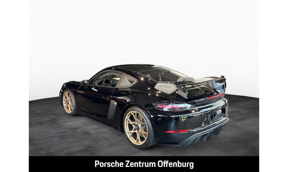 998617