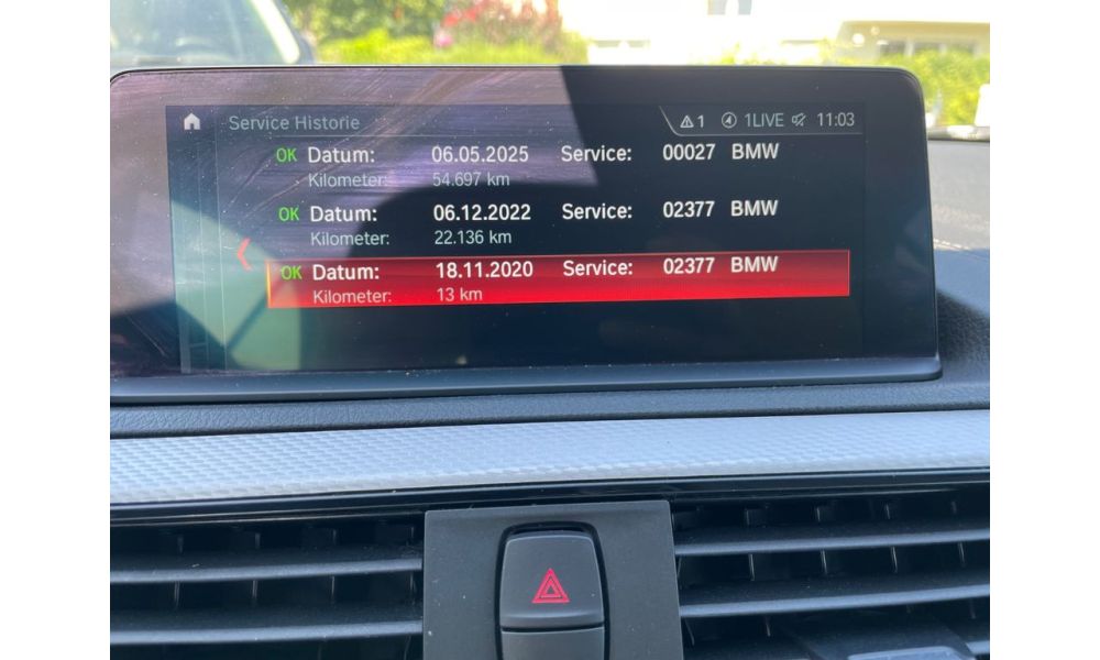 233211