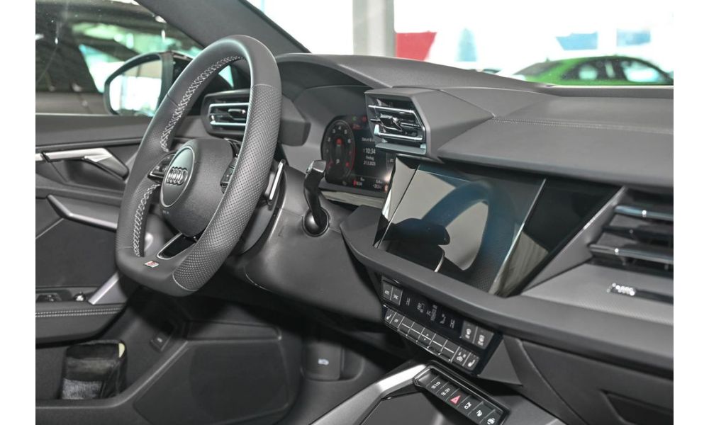 984077