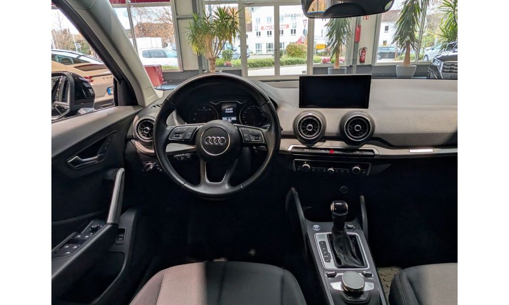 943661