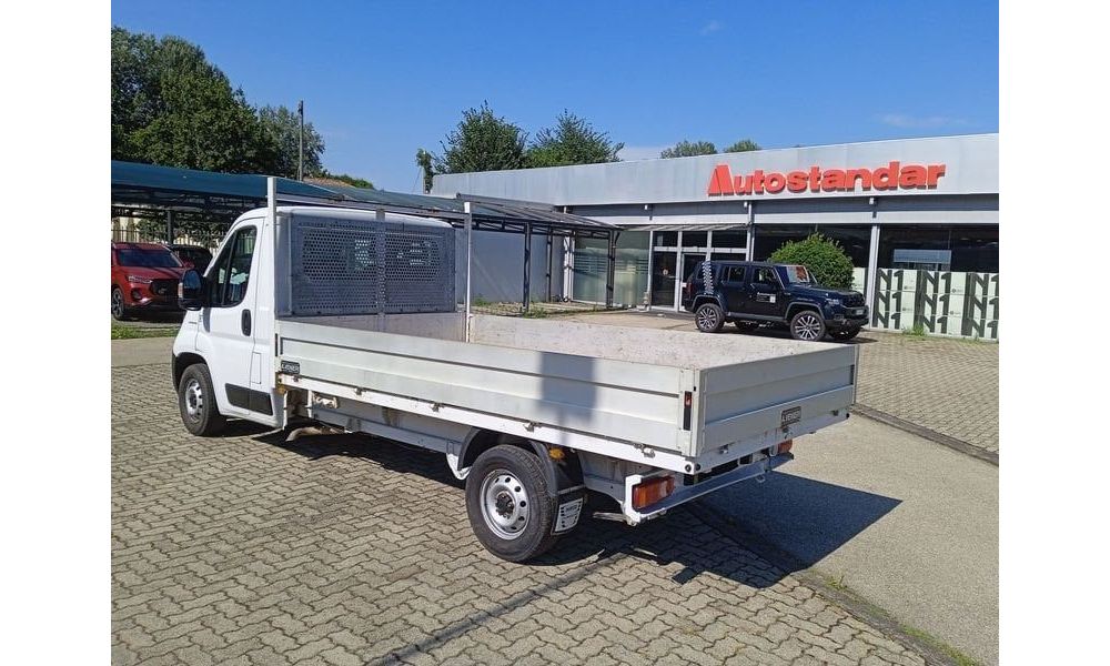 447077