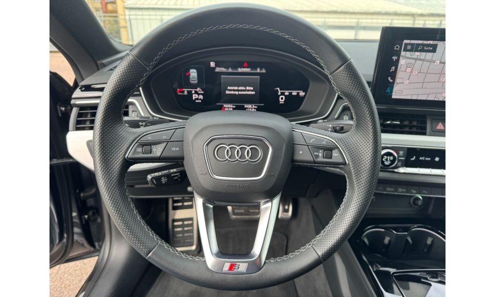 477911