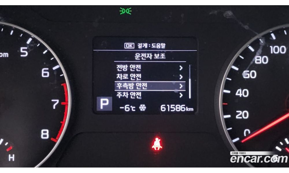 323010