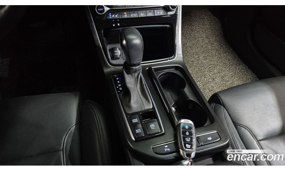 910560