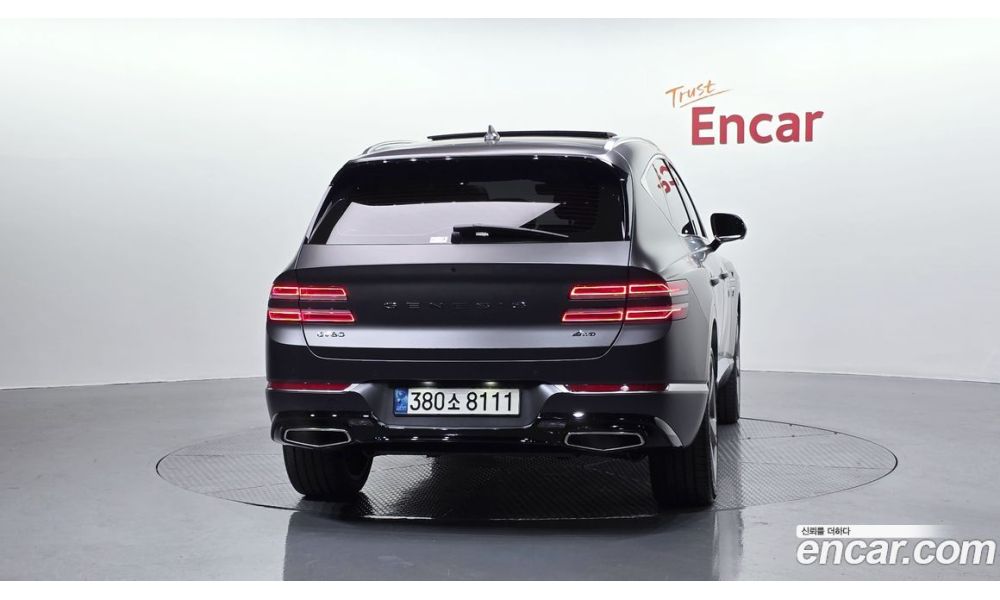 384058