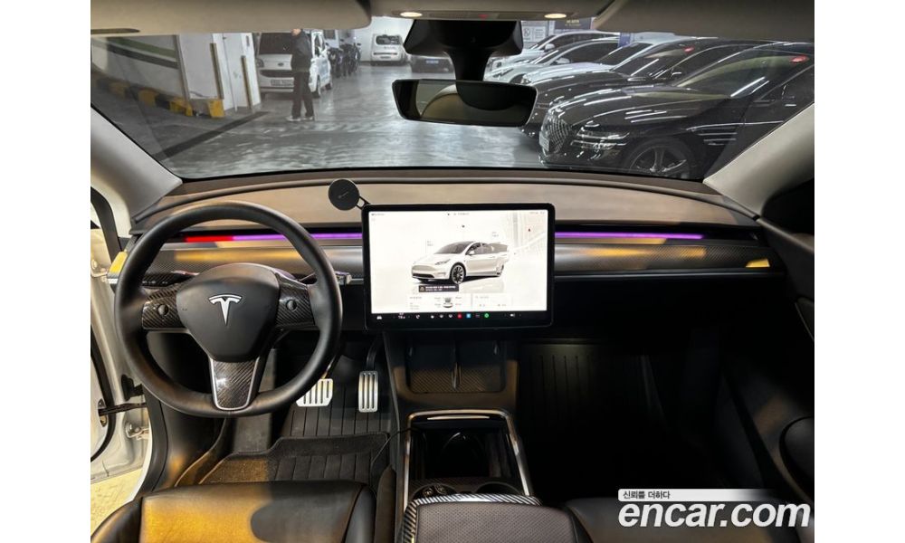 992477