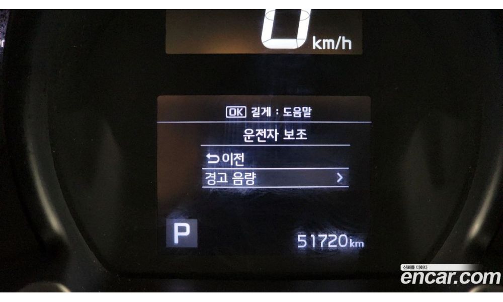 990025