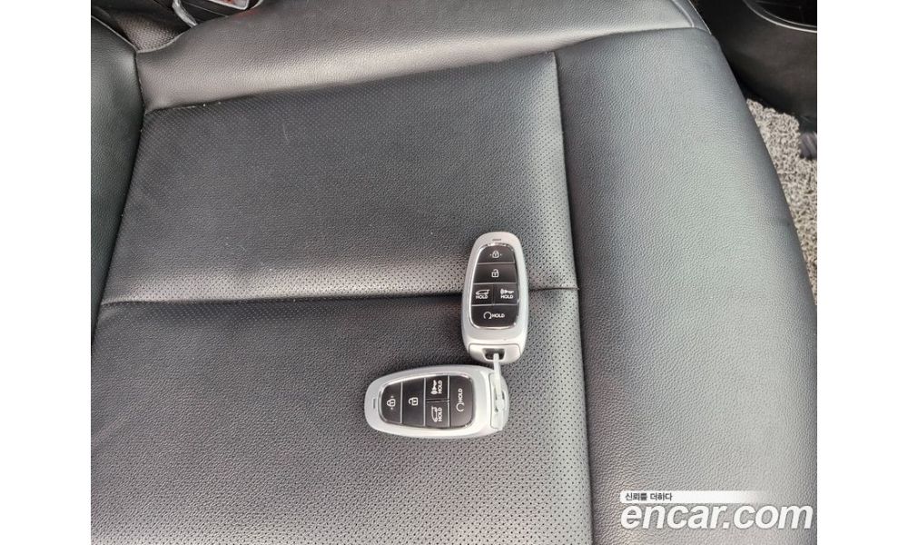 232597