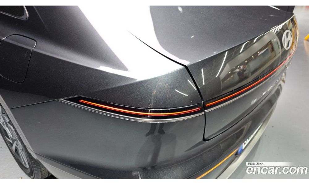 910744