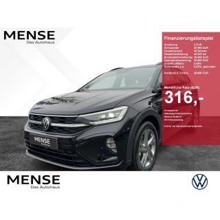 973576