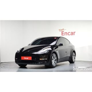 980995